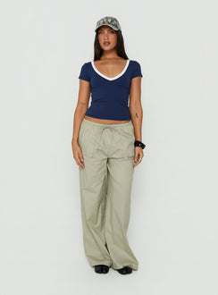Showcasing the Toren Drawstring Straight Leg Pants Stone womens-regular-pants with mid-rise front view of model wearing Princess Polly
