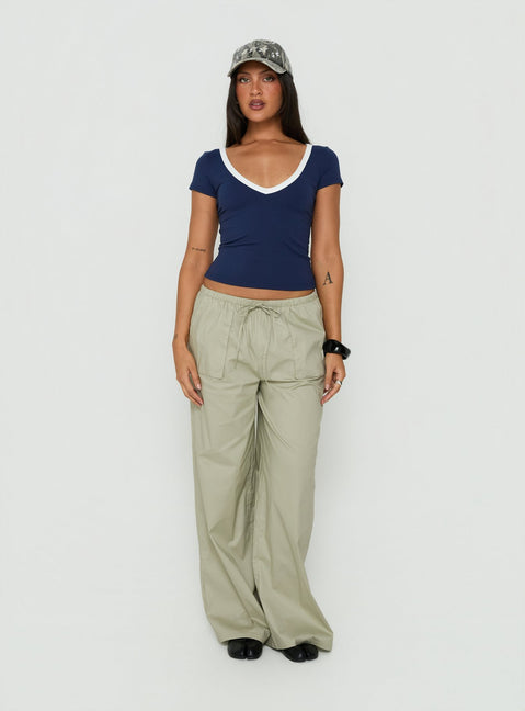 Showcasing the Toren Drawstring Straight Leg Pants Stone womens-regular-pants with mid-rise front view of model wearing Princess Polly