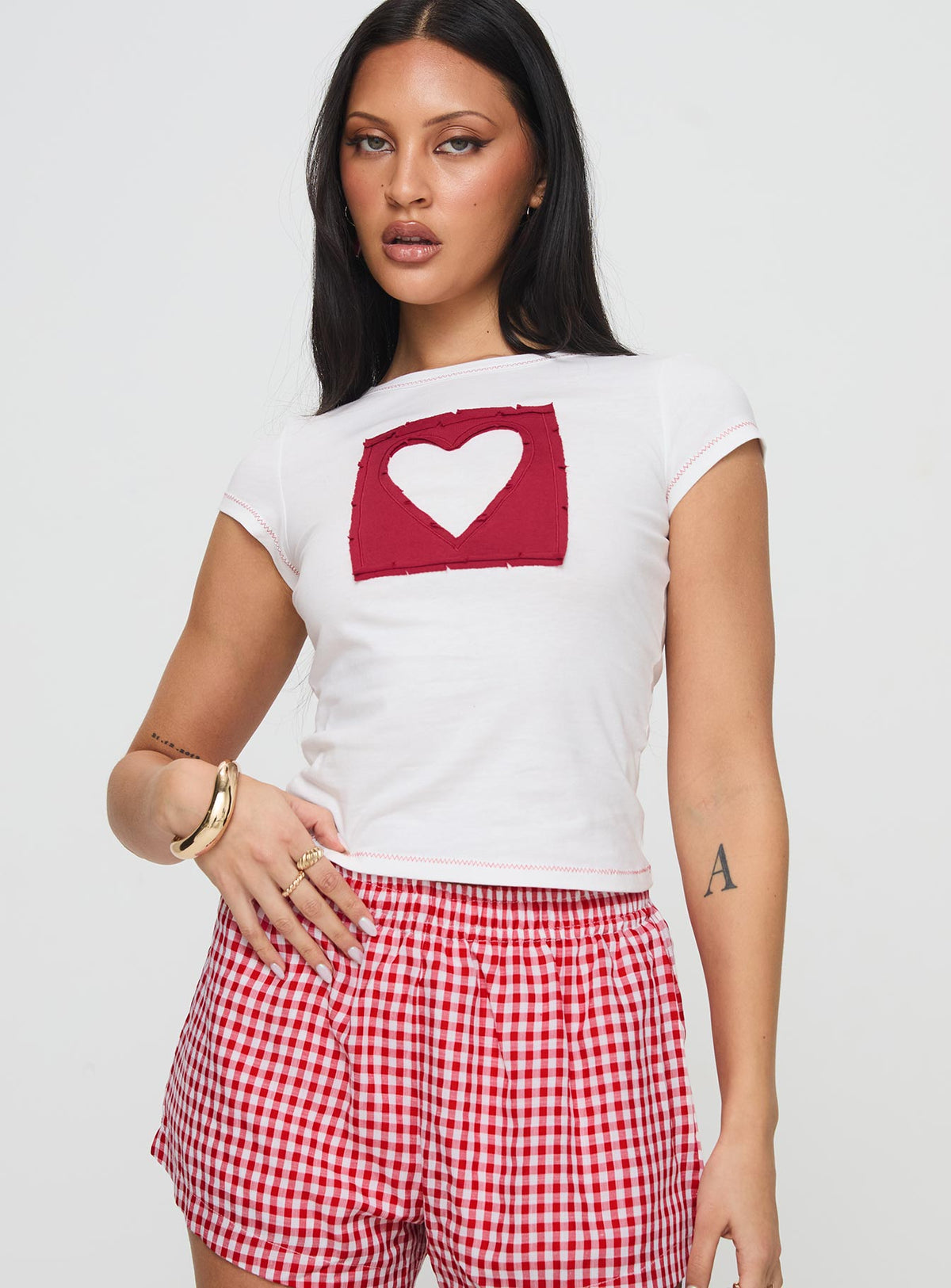 front view of model wearing Princess Polly Were Lovers Baby Tee White Short Sleeves Crew Neck 