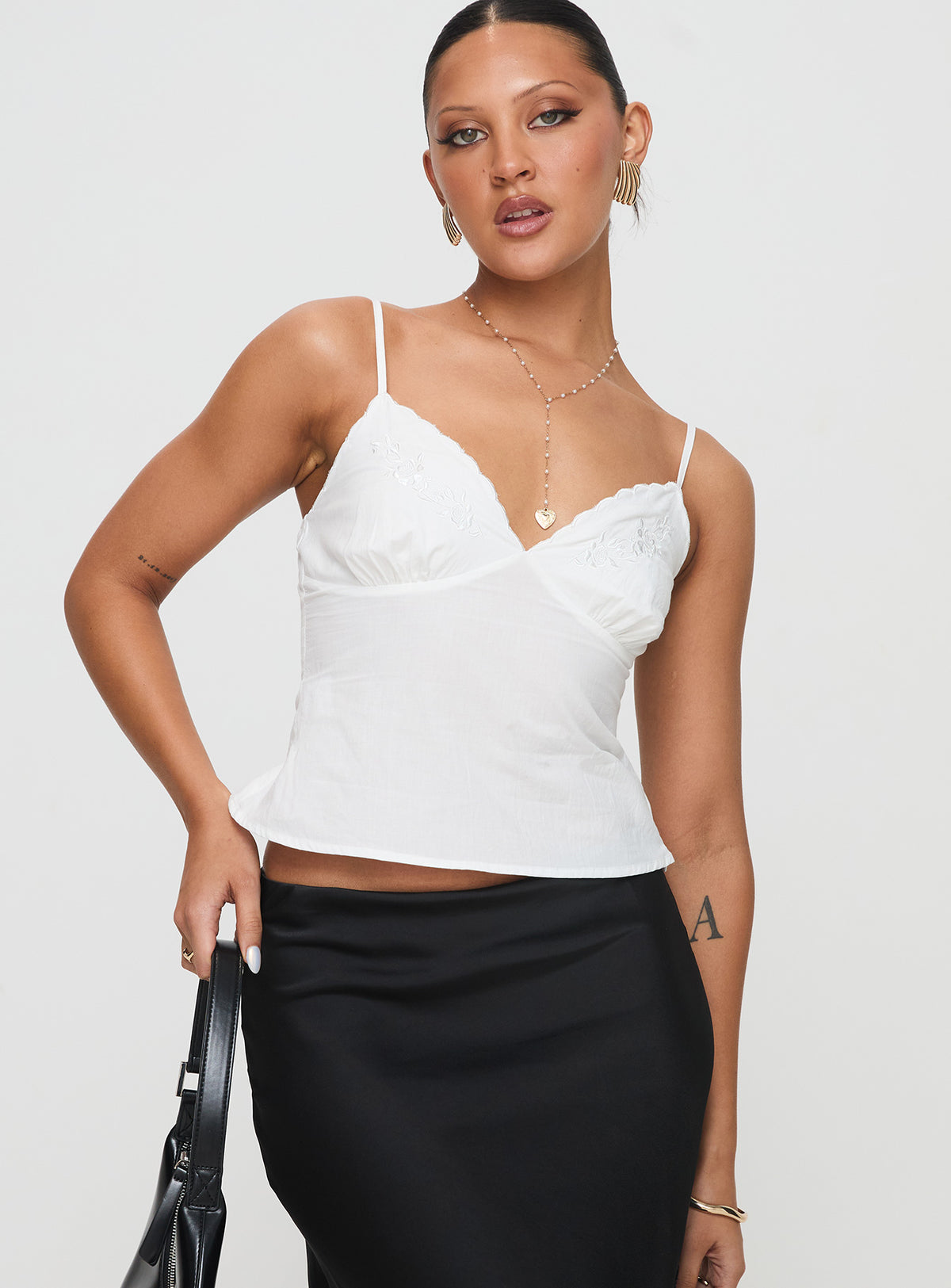 front view of model wearing Princess Polly Aruba Embroidered Cami White Sleeveless Plunger 