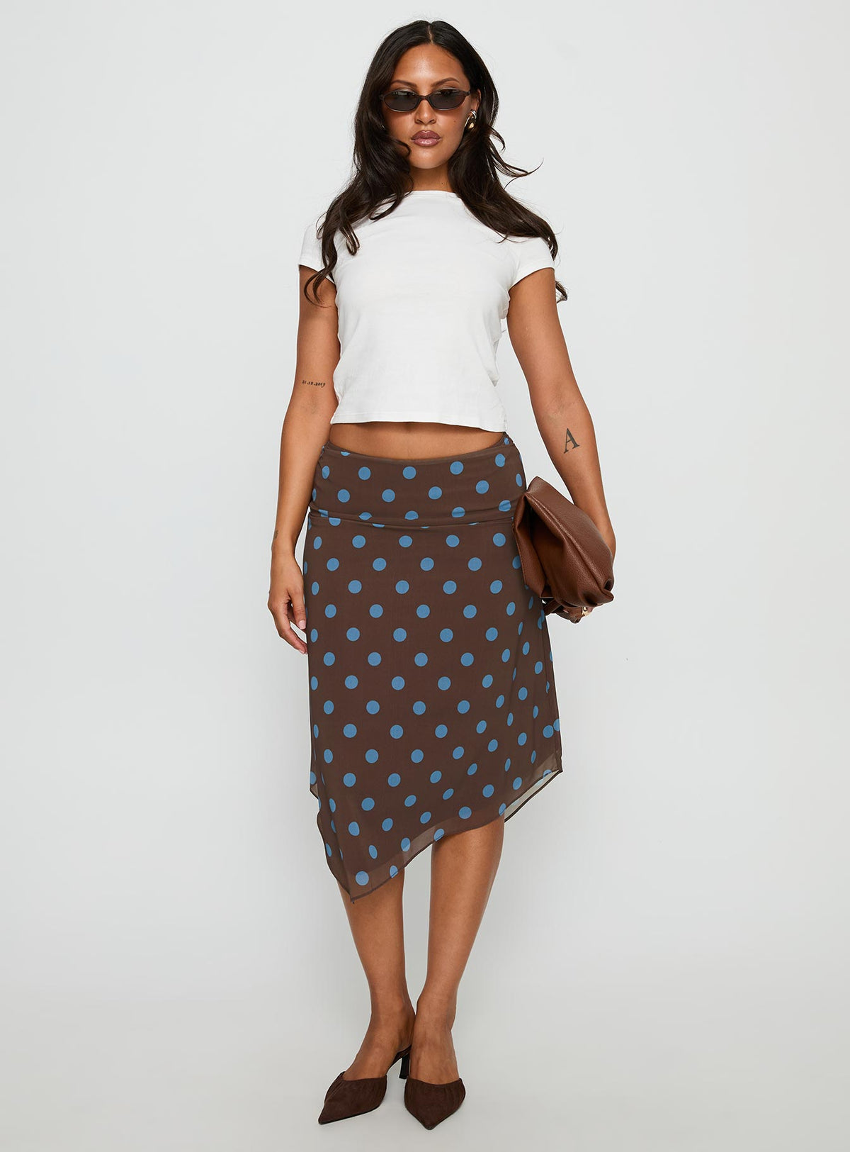   front view of model wearing Princess Polly Daphene Asymmetrical Midi Skirt Brown / Blue Polka Dot Midi Skirts Skirts 