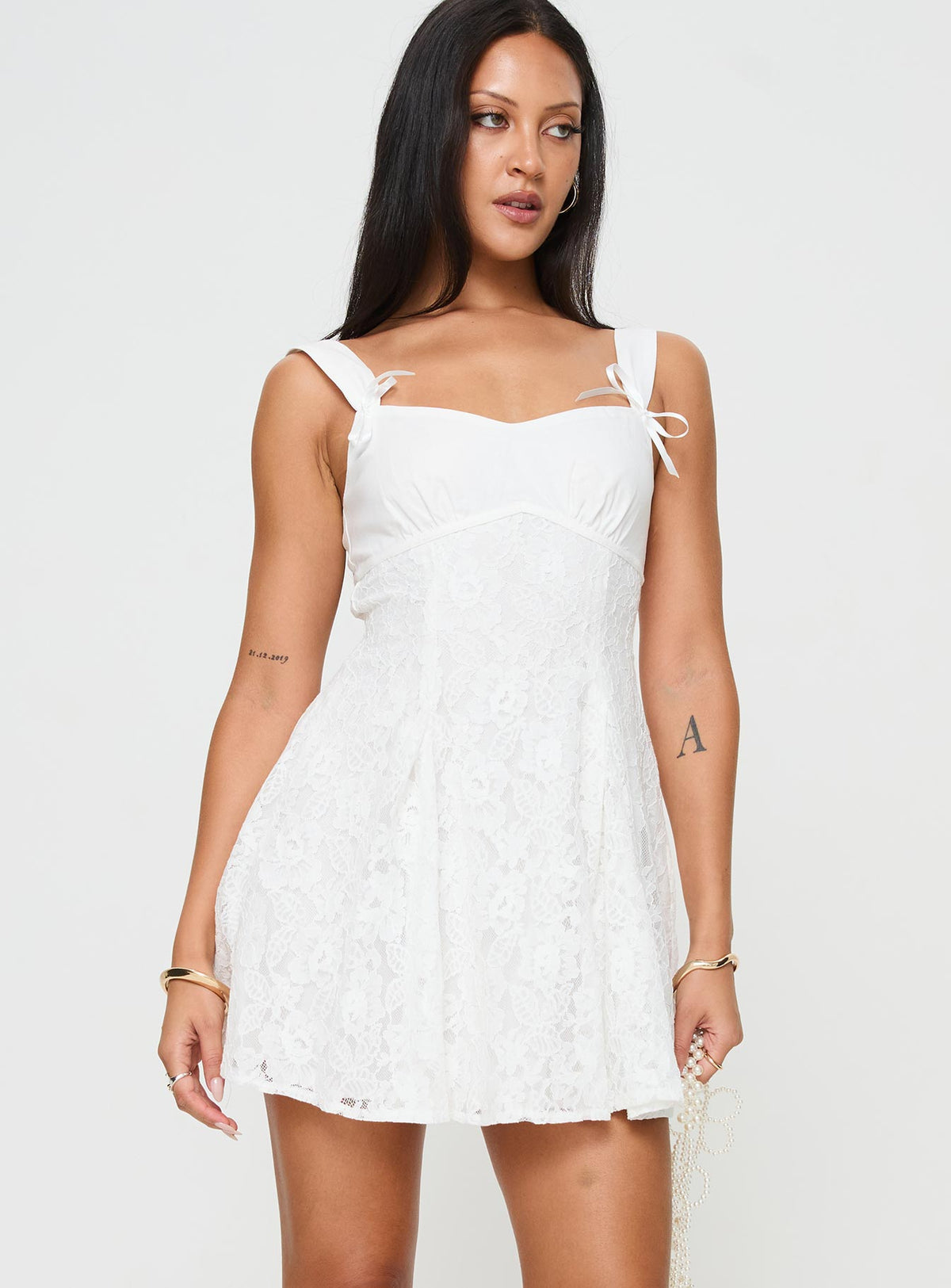front view of model wearing Princess Polly Tadea Mini Dress White Sweetheart Neckline 