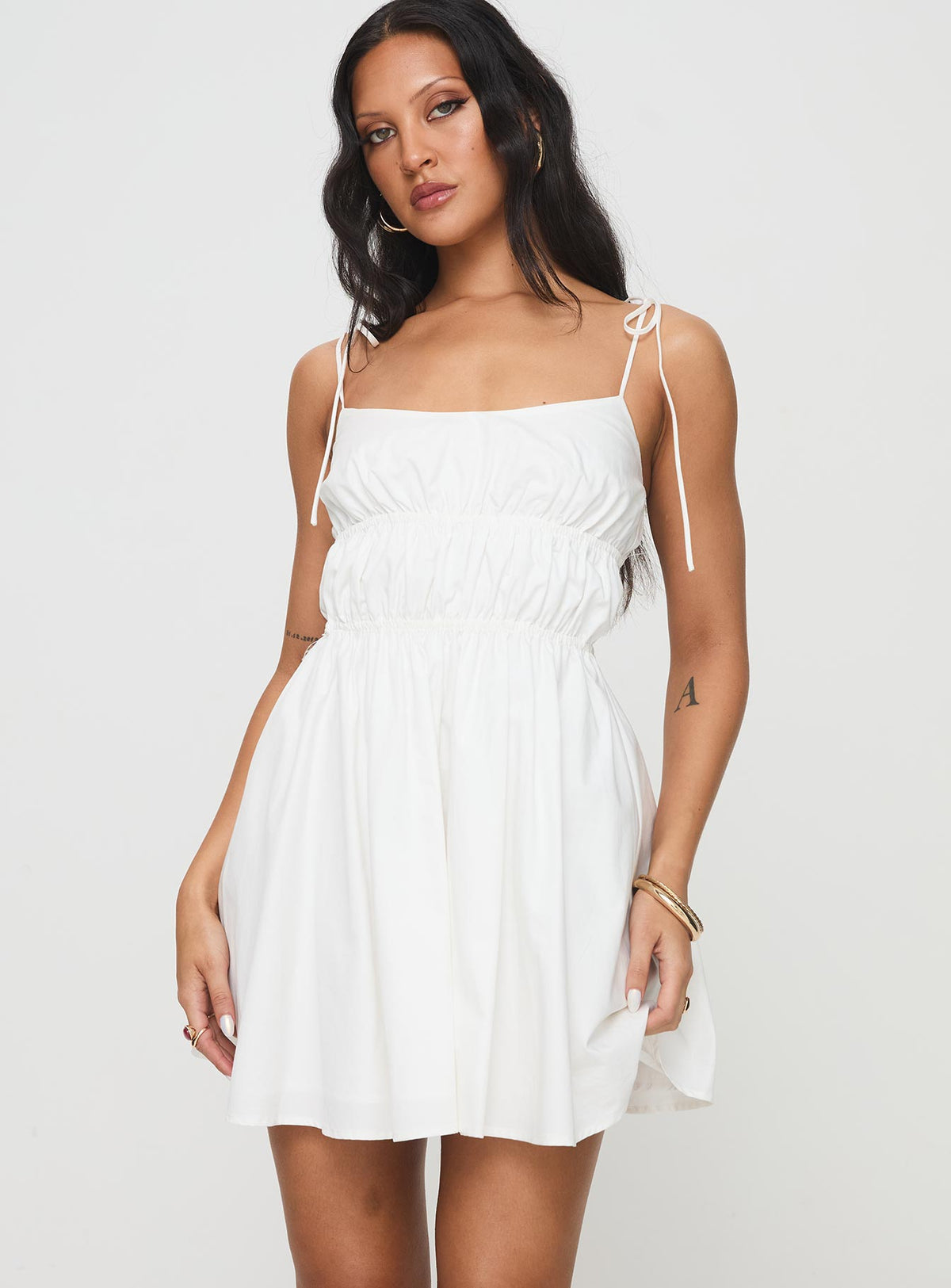 side view of model wearing Princess Polly Jacksonne Mini Dress White Scoop Neck 