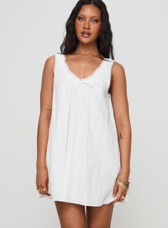 front view of model wearing Princess Polly Antiquity Swing Mini Dress White Petite V-Neck 