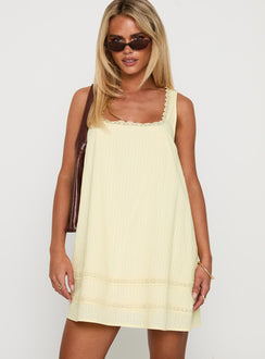 front view of model wearing Princess Polly Alanah Mini Dress Lemon Square Neck 