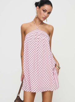 side view of model wearing Princess Polly Moonlit Mini Dress Pink Stripe Petite Asymmetric Neckline 