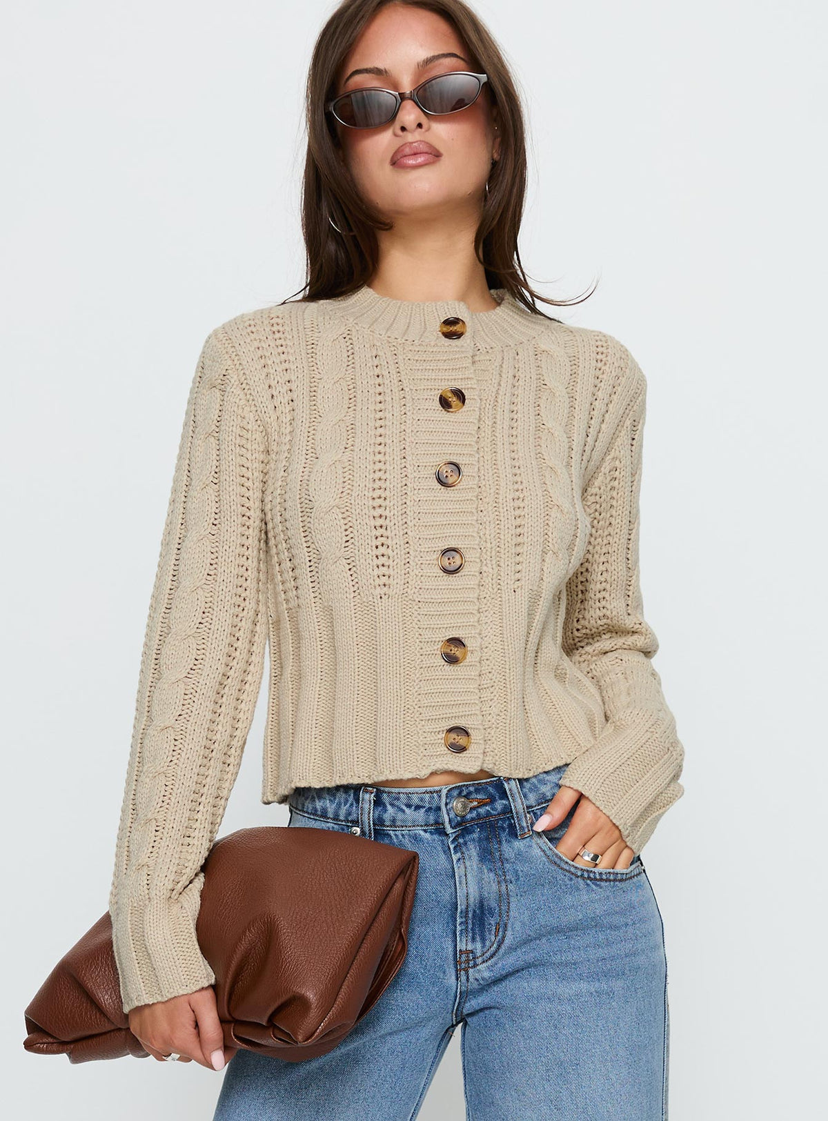 front view of model wearing Princess Polly Donielle Cable Knit Cardigan Beige cropped Jumpers 