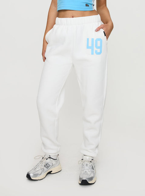 Crafted from USD Sweatpants White in womens-regular-pants with mid-rise waist, front view of model wearing Princess Polly