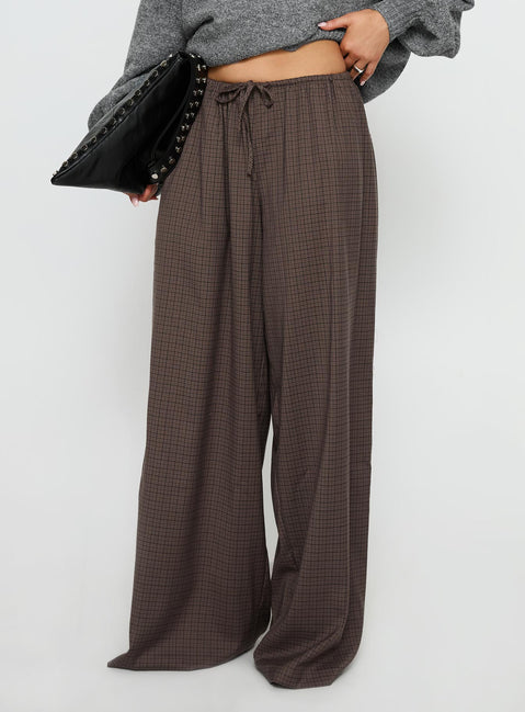 side view of model wearing Princess Polly Bungala Oversized Relaxed Pants Brown Check Mid Rise Pants Pants 