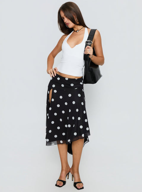   front view of model wearing Princess Polly Dulciana High Split Asymmetrical Midi Skirt Black / Polka Dot Midi Skirts Skirts 