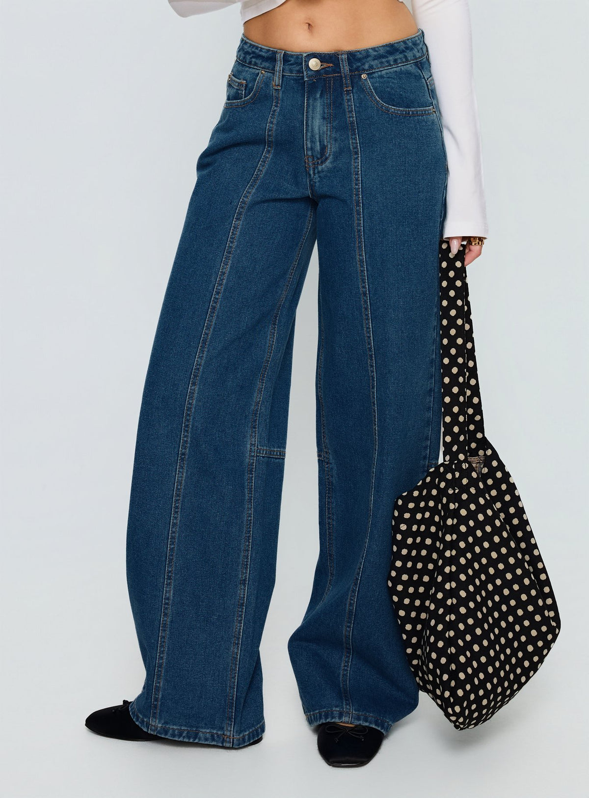 front view of model wearing Princess Polly Lando Low Rise Straight Leg Jeans Mid Blue Wash Mid Rise Jeans Jeans 