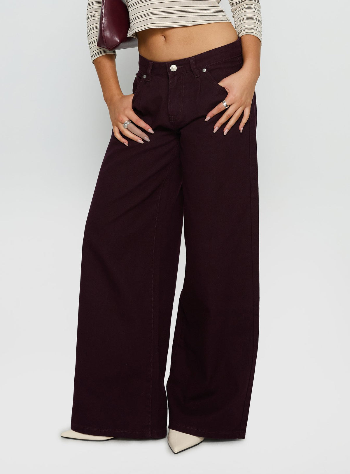 back view of model wearing Princess Polly Supercut Low Rise Baggy Pleat Jeans Currant Mid Rise Jeans Jeans 