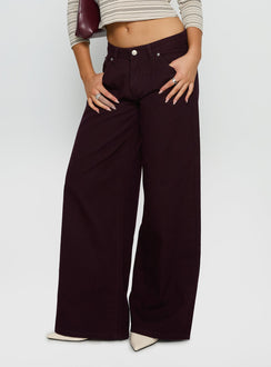 back view of model wearing Princess Polly Supercut Low Rise Baggy Pleat Jeans Currant Mid Rise Jeans Jeans 