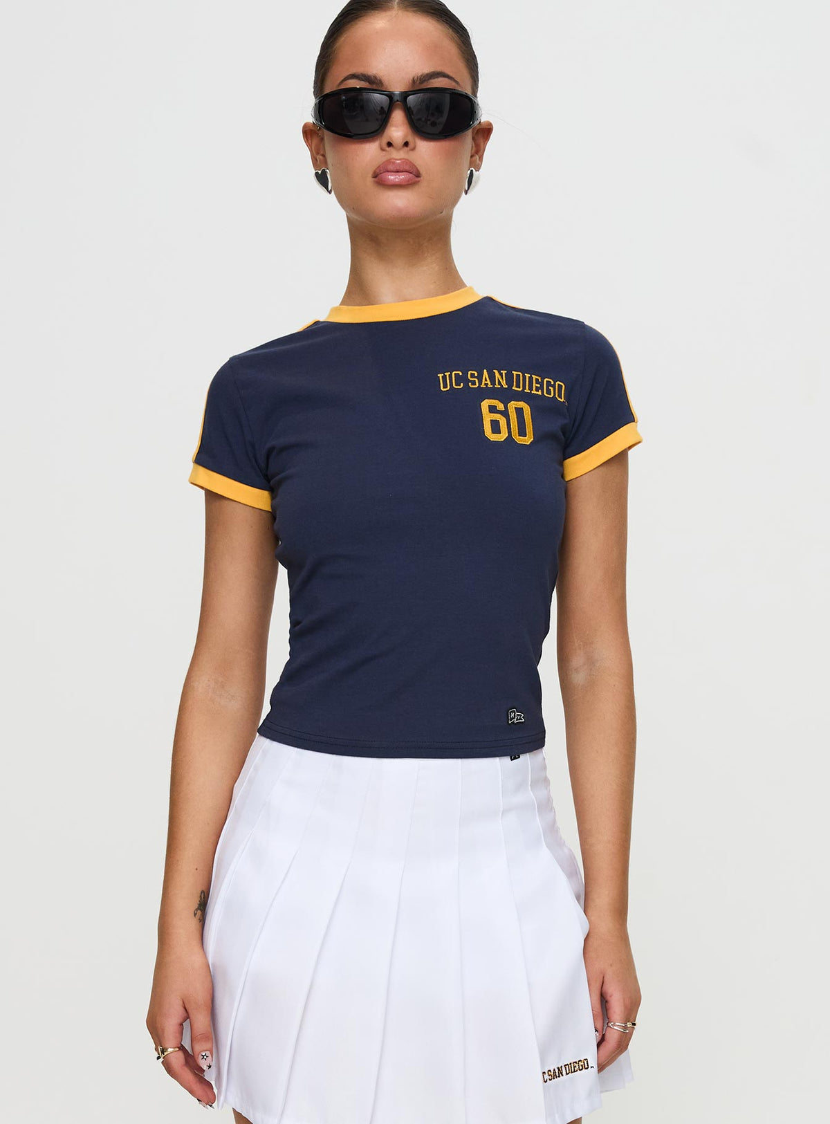 front view of model wearing Princess Polly UCSD Goalie Baby Tee Navy Short Sleeves Crew Neck 