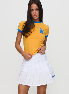   front view of model wearing Princess Polly UCLA Tennis Skort White Skirts 