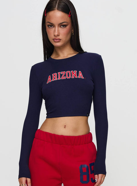 front view of model wearing Princess Polly U of A Bring It Back Long Sleeve Top Navy Full Sleeves Crew Neck 
