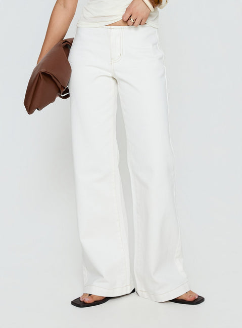 Showcasing Buenos No Waist Low Rise Straight Leg Jeans in womens-jeans with low-rise side view of model wearing Princess Polly