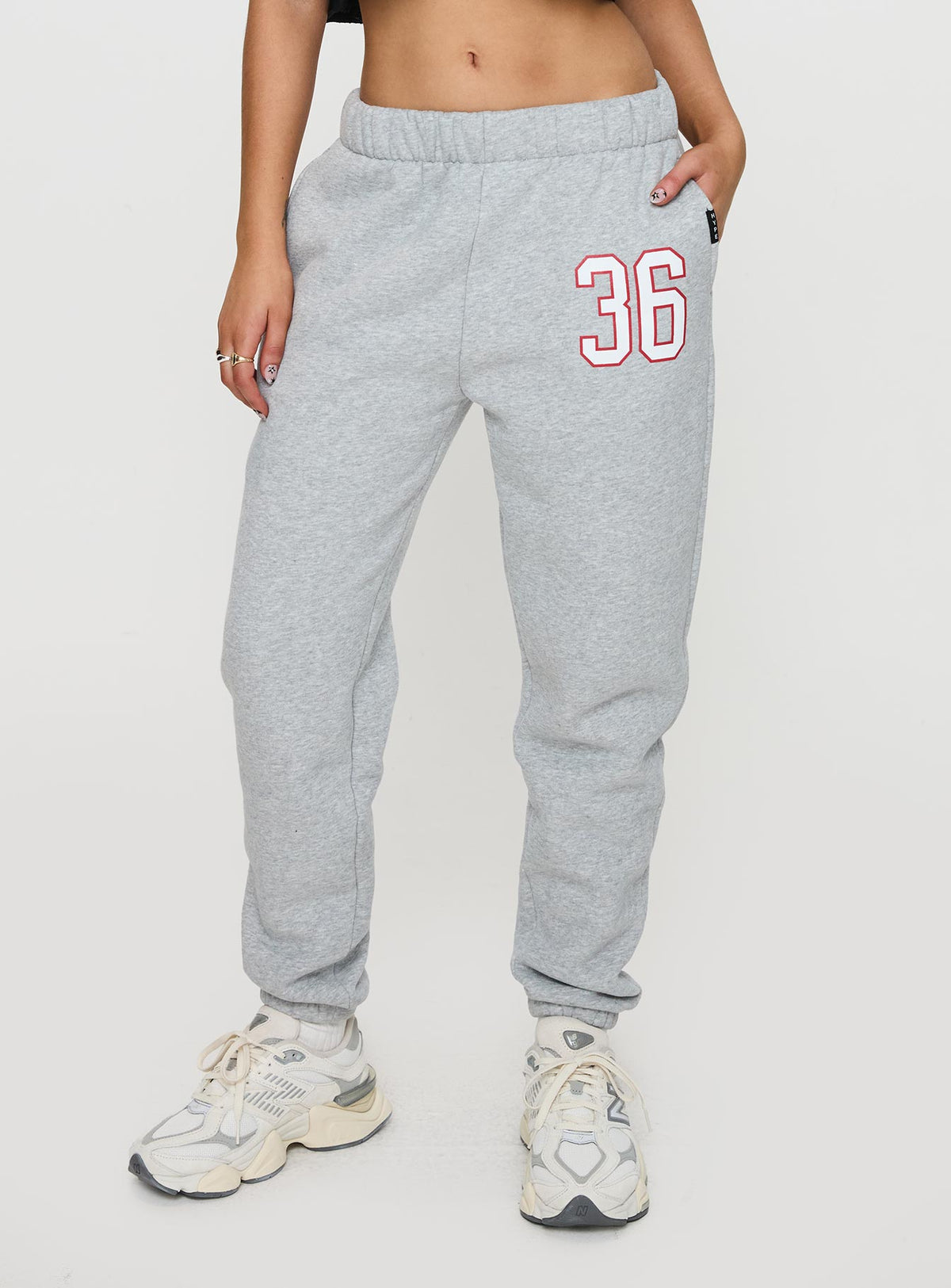 back view of model wearing Princess Polly Harvard Sweatpants Grey Pants 