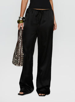 side view of model wearing Princess Polly Soulstar Satin Pants Black High Rise Pants Pants 