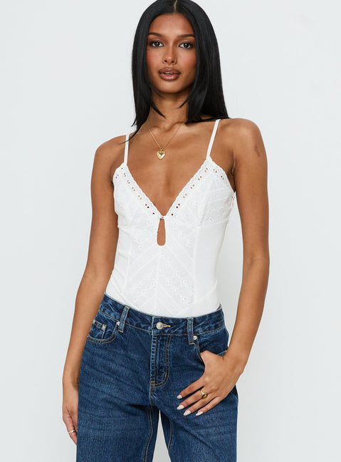 side view of model wearing Princess Polly Nerisse Keyhole Bodysuit White Sleeveless Bodysuit 