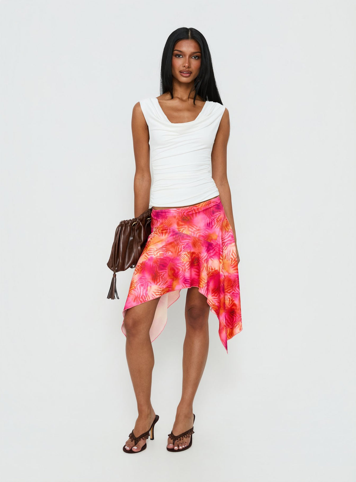   side view of model wearing Princess Polly Kimberlee Asymmetrical Midi Skirt Multi Skirts 