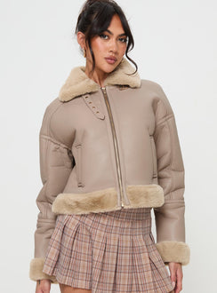 Beige Faux leather jacket Gold toned hardware, zip fastening down front, buckle fastening at neck, twin hip pockets