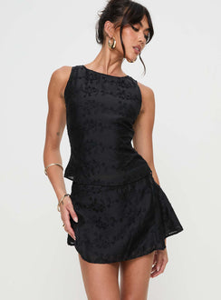 back view of model wearing Princess Polly Perilla Mini Skirt Black Mini Skirts Skirts 