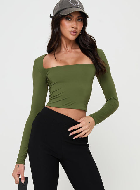 front view of model wearing Princess Polly Back In Time Long Sleeve Top Olive Full Sleeves Square Neck 