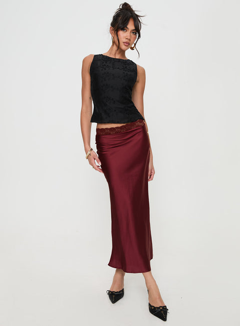   side view of model wearing Princess Polly The Charmaine Maxi Skirt Burgundy Midi Skirts Skirts 