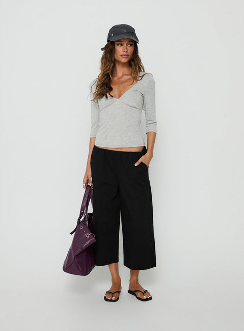 Featuring the Lunea Concealed Waistband 3/4 Pant Black Petite in womens-regular-pants with high-rise front view of model wearing Princess Polly