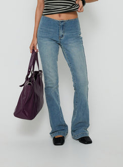 Featuring the Flow Rider No Waist Low Rise Bootleg Jean Vintage Blue Wash womens-jeans with low-rise waist product Princess Polly