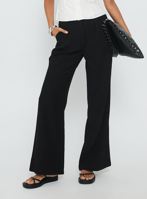 back view of model wearing Princess Polly Ambient Wide Leg Pant Black High Rise Pants Pants 