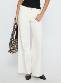 front view of model wearing Princess Polly Catiana Low Rise Wide Leg Jeans White Low Rise Jeans Jeans 