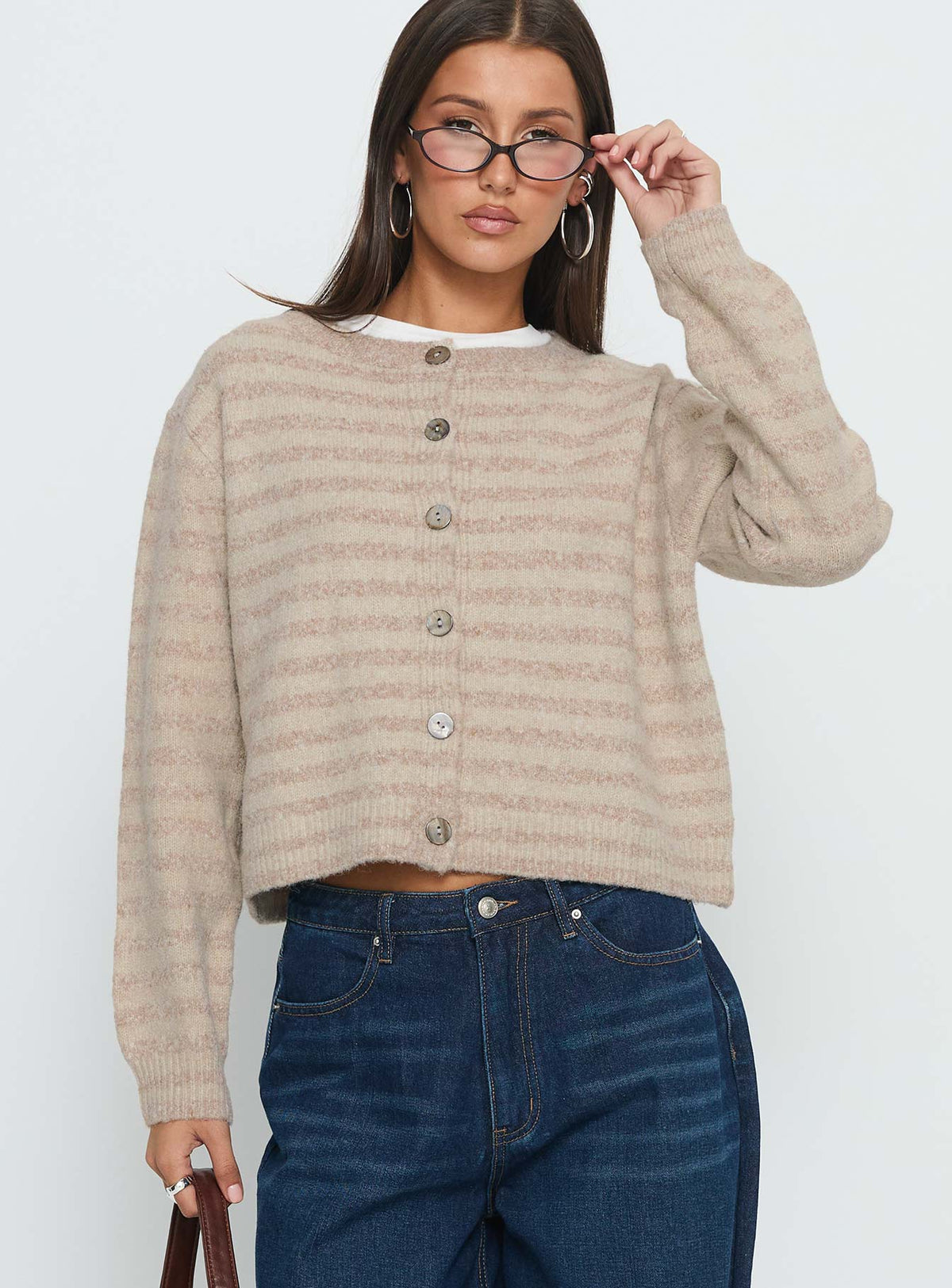 Featuring the Raynna Button Up Cardigan Beige Stripe womens jumpers in short length front view of model wearing Princess Polly