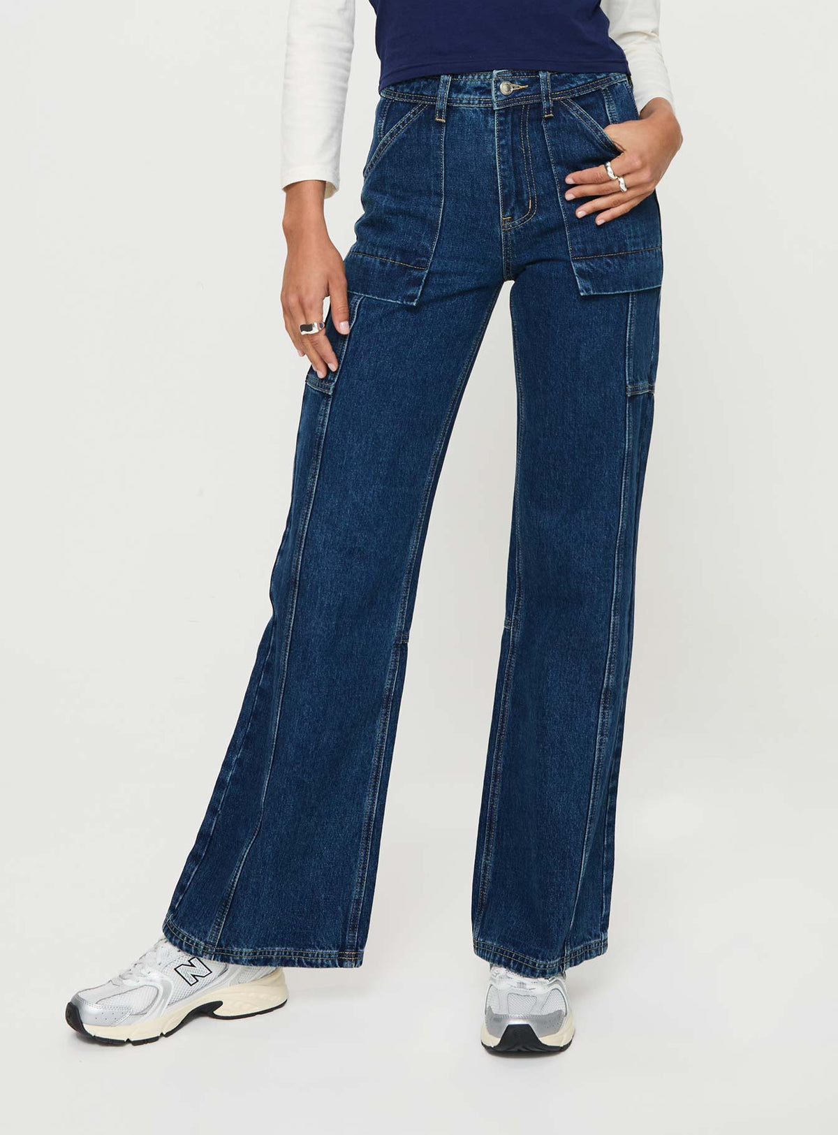 front view of model wearing Princess Polly Chad High Rise Wide Leg Cargo Jeans Dark Wash Denim Mid Rise Jeans Jeans 