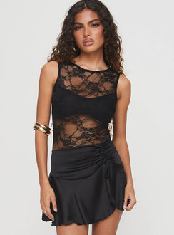 front view of model wearing Princess Polly Feelix Sleeveless Lace Bodysuit Black Sleeveless Bodysuit 