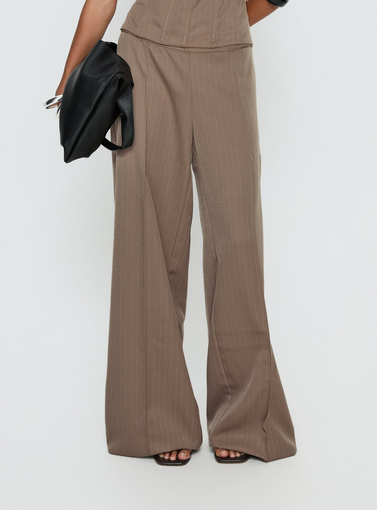 back view of model wearing Princess Polly Madelle Mid Rise Straight Leg Pants Brown Pinstripe Mid Rise Pants Pants 