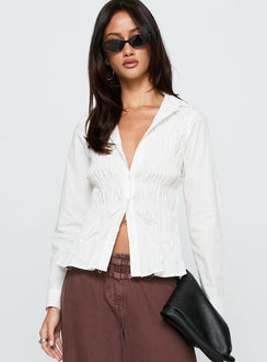 front view of model wearing Princess Polly Cultivate Shirred Long Sleeve Top White Full Sleeves V-Neck 