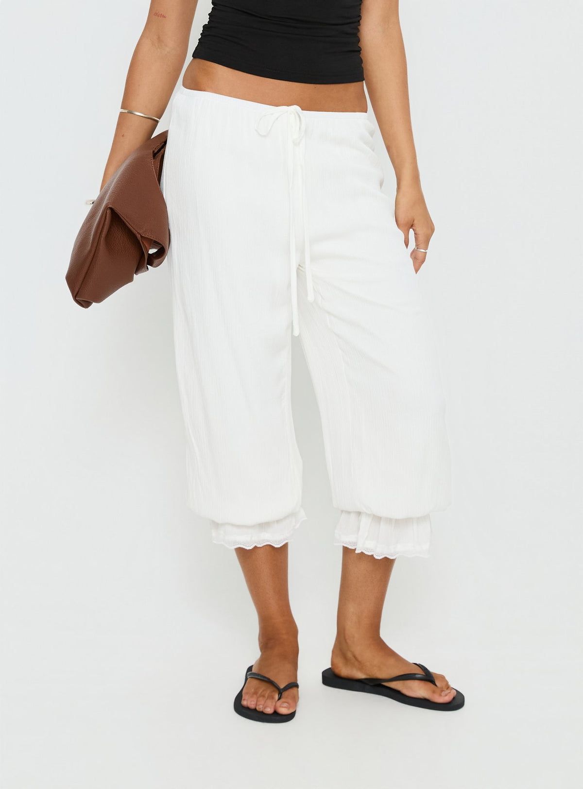 front view of model wearing Princess Polly Basma Bloomer Trouser Pants Rayon White Mid Rise Pants Pants 