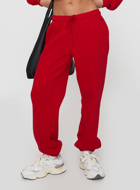 back view of model wearing Princess Polly Dream Fleece Ankle Cuff Sweatpants Red High Rise Pants Pants 