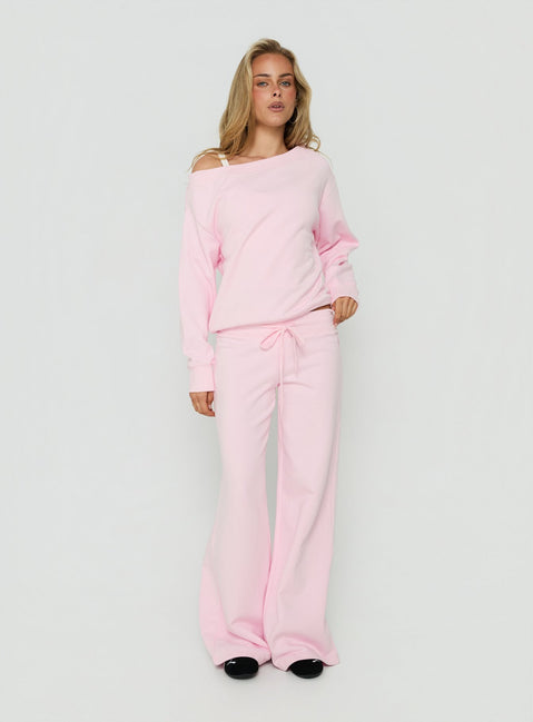 Featuring Dodie Wide Leg Pants Pink in womens regular pants with mid-rise front view of model wearing
