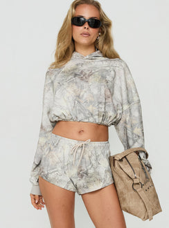 Featuring the Mayse Bubble Hem Cropped Hoodie Camo womens-jumpers in short length with camo print featuring hood and oversized fit front view of model wearing Princess Polly