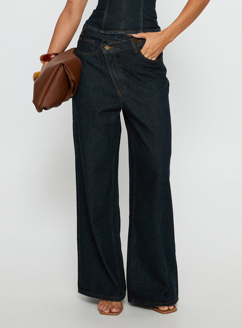 side view of model wearing Princess Polly Blue Crush Low Rise Wide Leg Jeans Indigo Mid Rise Jeans Jeans 