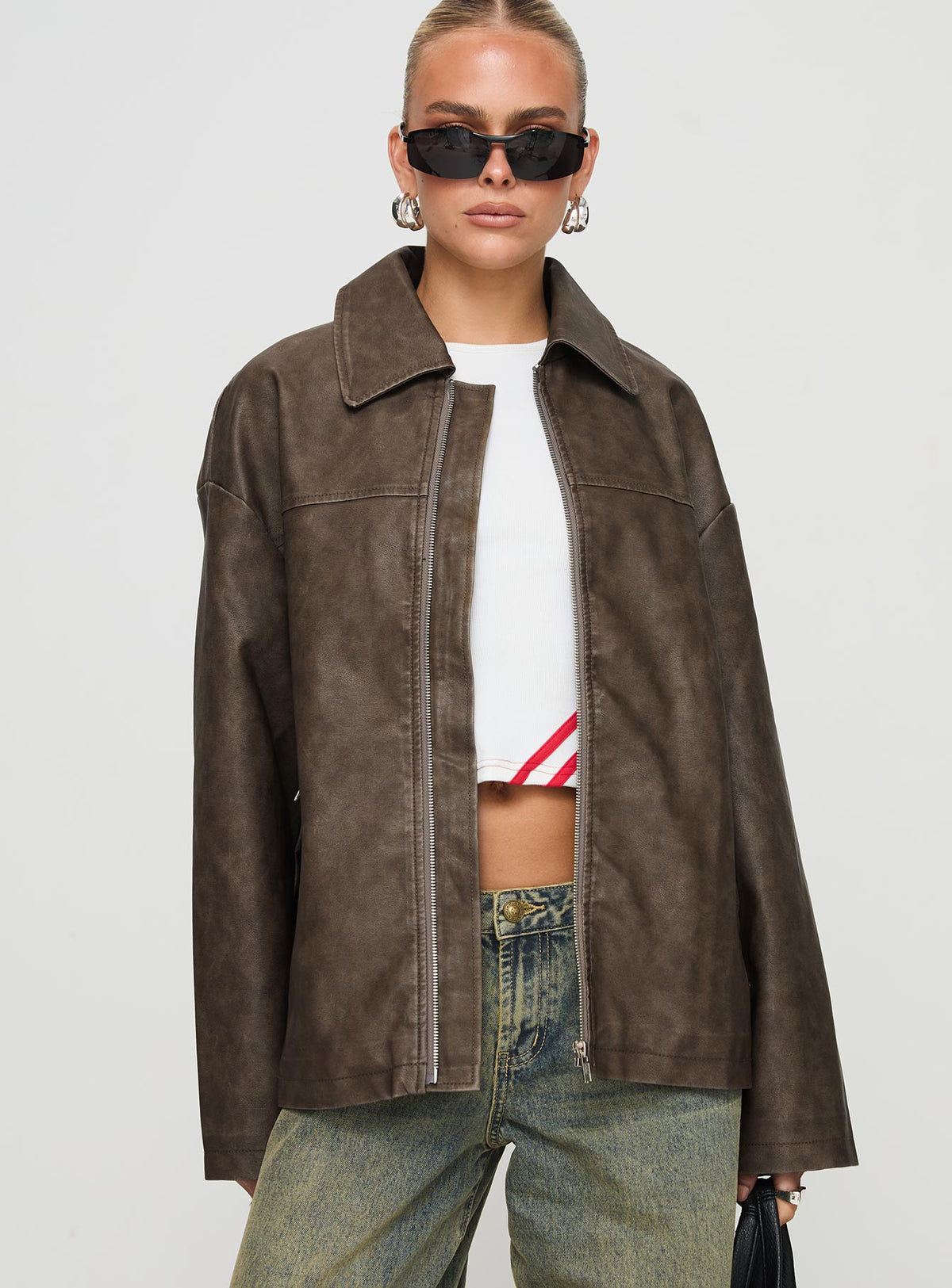 Faux leather jacket Oversized fit, classic collar, drop shoulder, zip fastening, twin hip pockets Good stretch, fully lined 