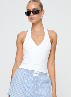 front view of model wearing Princess Polly Stand By Halter Top White Sleeveless Plunger 