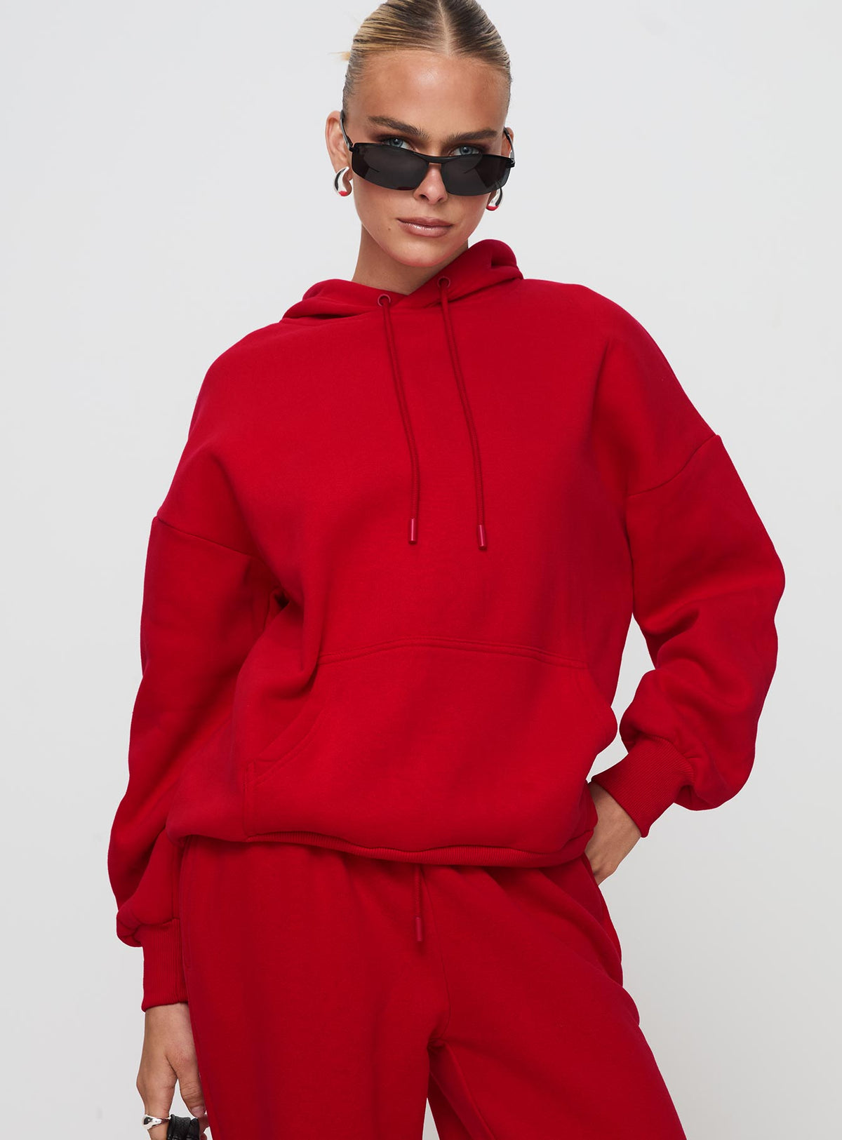front view of model wearing Princess Polly Dream Fleece Classic Hoodie Red Longline Jumpers Jumpers 