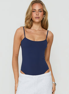 Showcasing the Daily Define Thin Strap Low Back Bodysuit Navy womens-bodysuit in sleeveless style front view of model wearing Princess Polly
