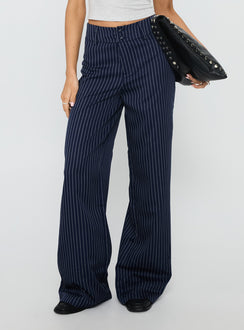 side view of model wearing Princess Polly Lorenne Mid Rise Pant Navy Pinstripe High Rise Pants Pants 