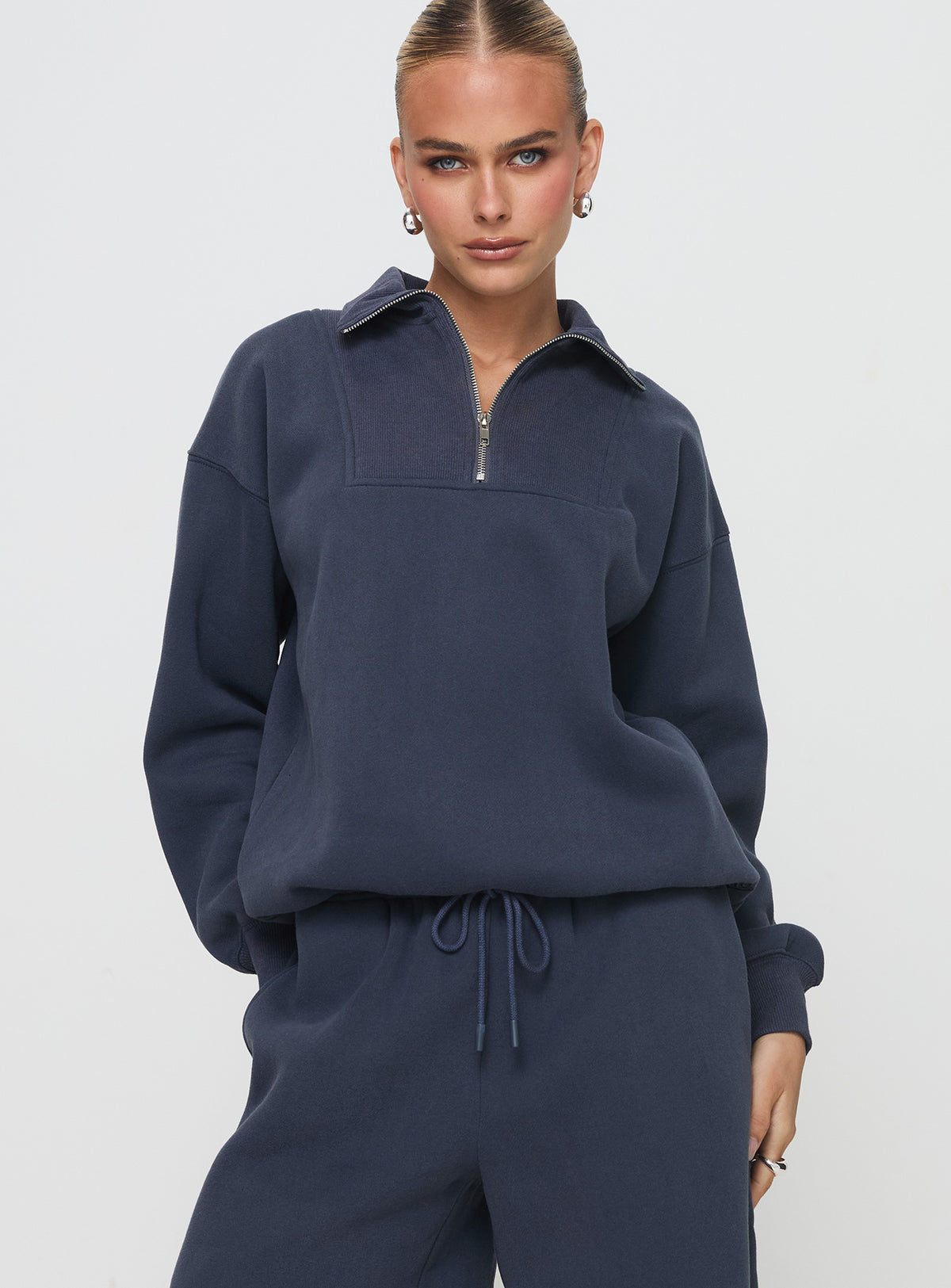 front view of model wearing Princess Polly Dream Fleece Quarter Zip Sweatshirt Navy Jumpers 