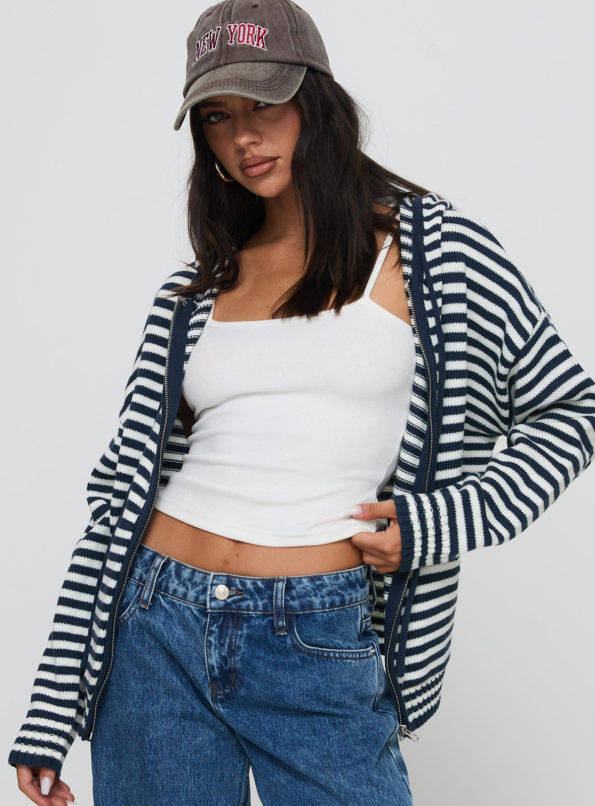 side view of model wearing Princess Polly Brienna Zip Jacket Navy Longline Jumpers Jumpers 